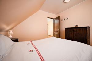 Postel nebo postele na pokoji v ubytování Cabana Mariuca Fundata