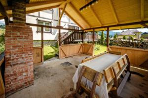 Balkón nebo terasa v ubytování Cabana Mariuca Fundata