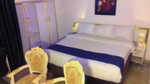 Postel nebo postele na pokoji v ubytování Autograph Apartment