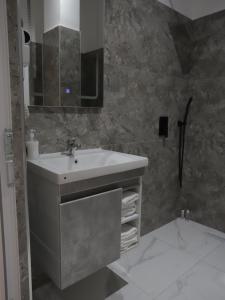 Koupelna v ubytování Shatri Hotel
