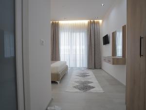 Postel nebo postele na pokoji v ubytování Shatri Hotel