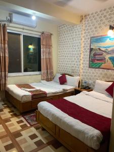 Katil atau katil-katil dalam bilik di The Tranqulity Inn