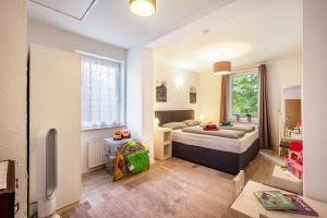 Ένα ή περισσότερα κρεβάτια σε δωμάτιο στο Appartement