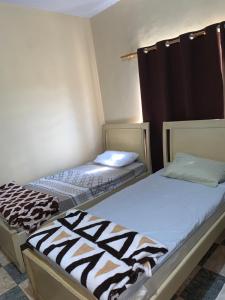Postel nebo postele na pokoji v ubytování Hotel Potiguar