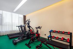 Fitness centrum a/nebo fitness zařízení v ubytování Glean Hotel Xinzhou
