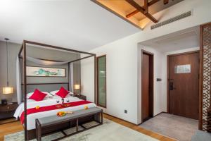 Postel nebo postele na pokoji v ubytování Glean Hotel Xinzhou