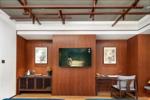 TV a/nebo společenská místnost v ubytování Glean Hotel Xinzhou