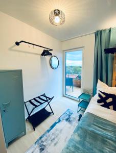 Postel nebo postele na pokoji v ubytování Apartment Krautinsel mit Seeblick