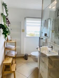 Koupelna v ubytování Apartment Krautinsel mit Seeblick