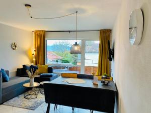 Posezení v ubytování Apartment Krautinsel mit Seeblick