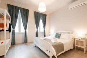 Cama o camas de una habitación en Winkler Suites