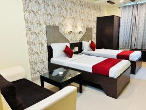 Postel nebo postele na pokoji v ubytování Hotel Chariot Inn Patna