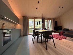 Cucina o angolo cottura di Bio Design Appartements DAS GRAUE SCHAF - Kärnten Card im Sommer inklusive