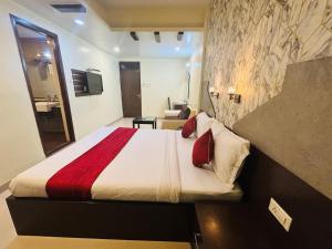 Postel nebo postele na pokoji v ubytování Hotel Chariot Inn Patna