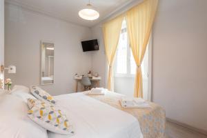 Cama o camas de una habitación en Winkler Suites