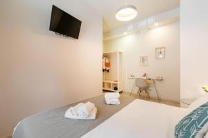 Cama o camas de una habitación en Winkler Suites