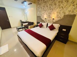 Postel nebo postele na pokoji v ubytování Hotel Chariot Inn Patna