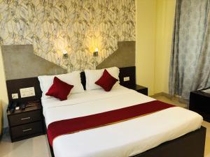Postel nebo postele na pokoji v ubytování Hotel Chariot Inn Patna
