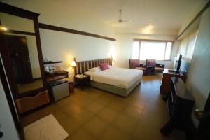 Postel nebo postele na pokoji v ubytování Annai Celestial Resorts