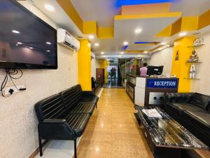 TV a/nebo společenská místnost v ubytování Hotel Chariot Inn Patna