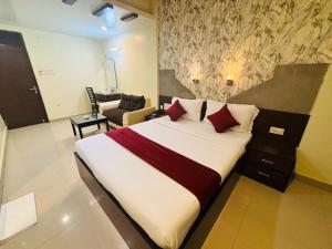 Postel nebo postele na pokoji v ubytování Hotel Chariot Inn Patna