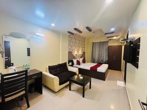 Postel nebo postele na pokoji v ubytování Hotel Chariot Inn Patna