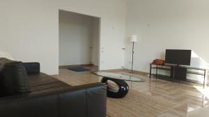 Χώρος καθιστικού στο Margot Perfect House