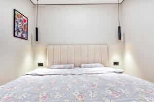 Ένα ή περισσότερα κρεβάτια σε δωμάτιο στο Aisulu - апартаменты в центре города - выбор для туриста и деловых поездок +55 φωτογραφίες