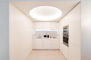 Η κουζίνα ή μικρή κουζίνα στο GuestReady - Central stay in Porto
