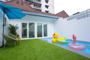 Herní místnost nebo prostor pro děti v ubytování Pool Villa Pattaya Phratamnak C2- 2 bedroom
