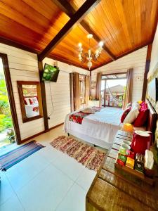 Cama ou camas em um quarto em Pousada Bela Vista