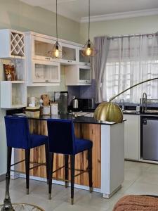 Kuchyň nebo kuchyňský kout v ubytování Alsander Homes Cherry