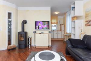 Η κουζίνα ή μικρή κουζίνα στο Ferienhaus Strandläufer +21 φωτογραφίες