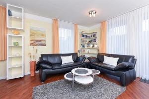 Χώρος καθιστικού στο Ferienhaus Strandläufer