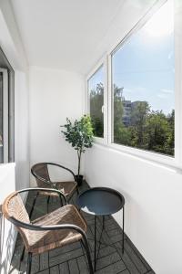 Balkón nebo terasa v ubytování GoldenHugo rooms