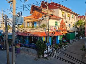 an overhead view of a building with colorful at The Funky Monkey Hostel - 18 to 40 years old only in Haad Rin