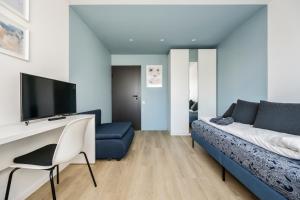 Postel nebo postele na pokoji v ubytování GoldenHugo rooms