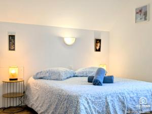 Postel nebo postele na pokoji v ubytování Maison 3 ch - Terrasse - Parking + 11 fotografií