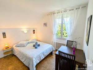 Postel nebo postele na pokoji v ubytování Maison 3 ch - Terrasse - Parking