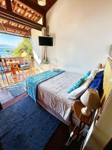 Cama ou camas em um quarto em Pousada Bela Vista mais 37 fotos