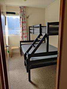 Postel nebo postele na pokoji v ubytování Sólbrekka Guesthouse