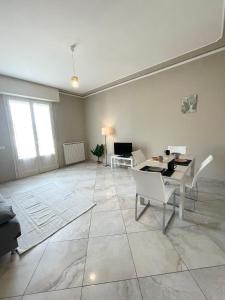 a large living room with a table and chairs at Il Cantuccino in Montecatini Terme +31 photos