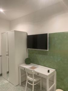 Televiisor ja/või meelelahutuskeskus majutusasutuses B&B La Scalina