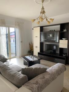 Μια τηλεόραση ή/και κέντρο ψυχαγωγίας στο Don Michele Apartments