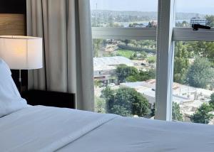 Postel nebo postele na pokoji v ubytování Amérian Carlos Paz & Suites + 37 fotografií