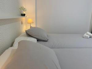 A bed or beds in a room at Mar y Playa de Martín, 2B