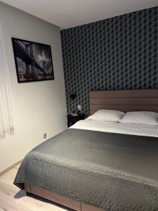 Posteľ alebo postele v izbe v ubytovaní Apartments Gradowa