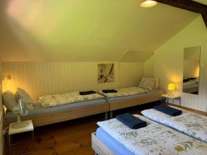 Ένα ή περισσότερα κρεβάτια σε δωμάτιο στο Waterfall Chalet