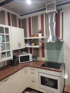 Η κουζίνα ή μικρή κουζίνα στο CasaLaFrancesa - Guma