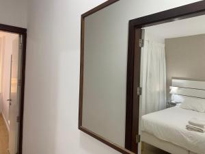 A bed or beds in a room at Mar y Playa de Martín, 2B